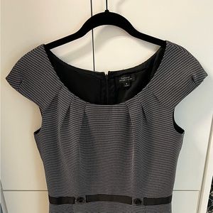 Beautiful knee-length Tahari sheath dress.